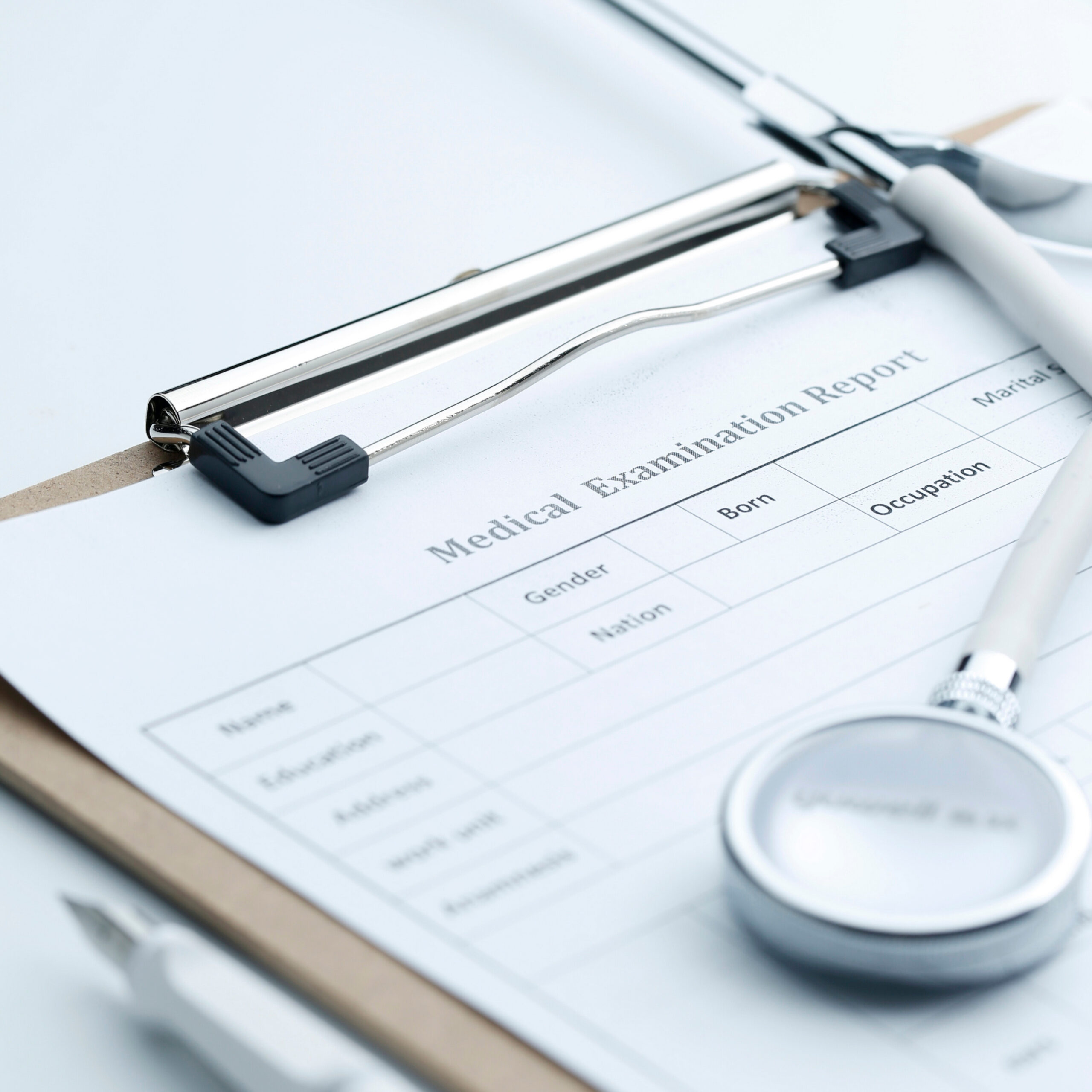 medical-examination-report-stethoscope-white-desktop - Edited